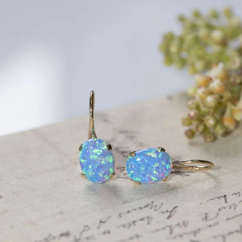 14K Yellow Gold Oval Blue Opal 6X8mm Dangle Earrings